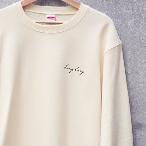 靴紐結んでたら鞄から中身出てきた | スウェット ナチュラル